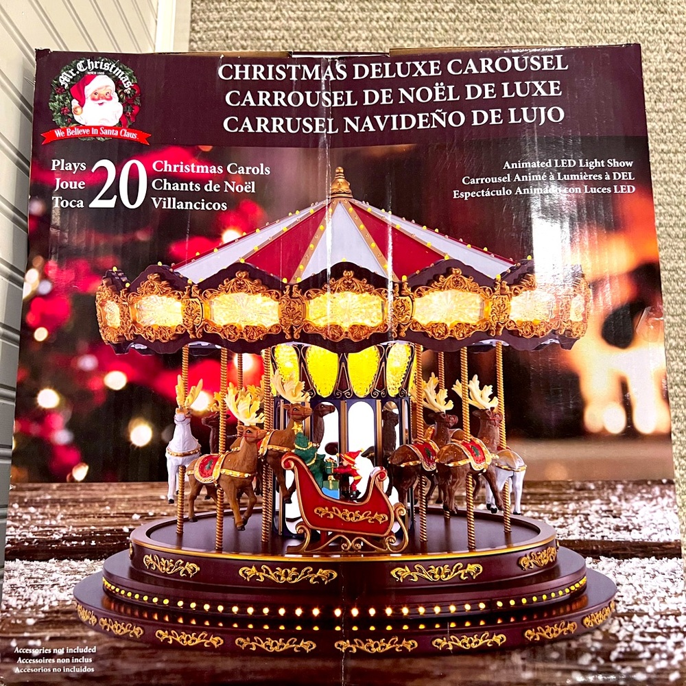 Brand new in box Christmas carousel that plays 20 Christmas songs